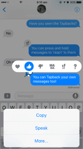 iMessage screen with message reactions highlighted, displaying several tapback symbols.