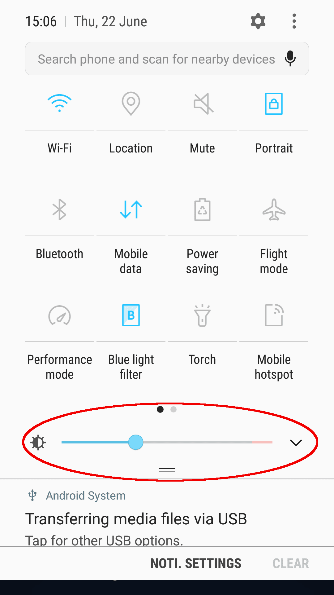 Phone settings screen with brightness slider circled.'