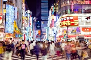 Crowd of People Crossing Street in Tokyo, Japan.