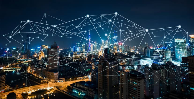 Réseau abstrait connecté sur une ville la nuit.