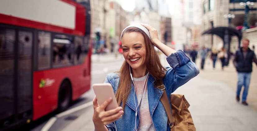 a young woman walking on the street.