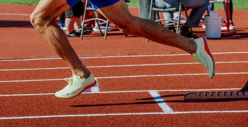 Athlete running at sports event.