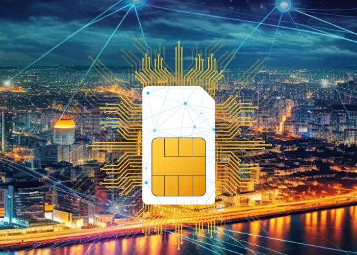 Abstract SIM card on city at night.