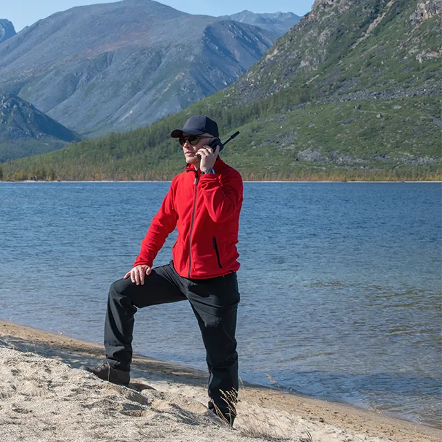 A man using a satellite phone