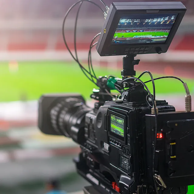 a video camera recording at a live game